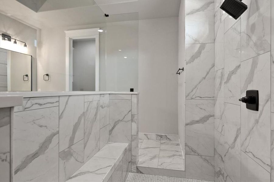 Bathroom with a tile shower