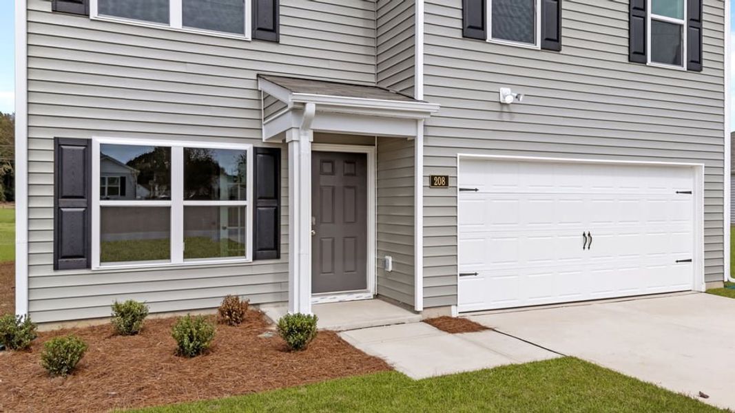 Exterior details and patio area of a home in Madeline Farm, New Bern (Image 3).