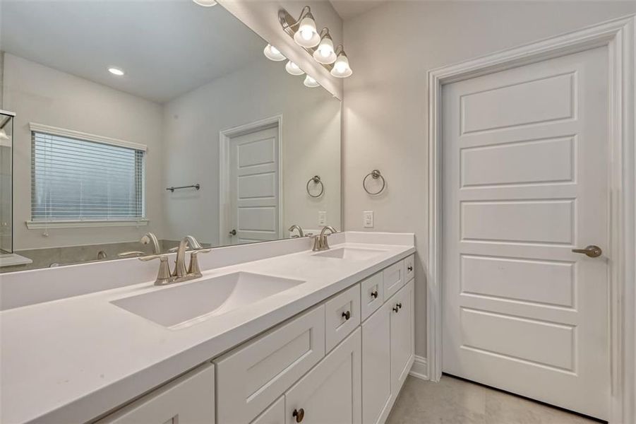 Representative furnished interior of a home built from the Plan 2500 by Adams Homes in The Bluffs at Lafayette, Freeport (Image 11).