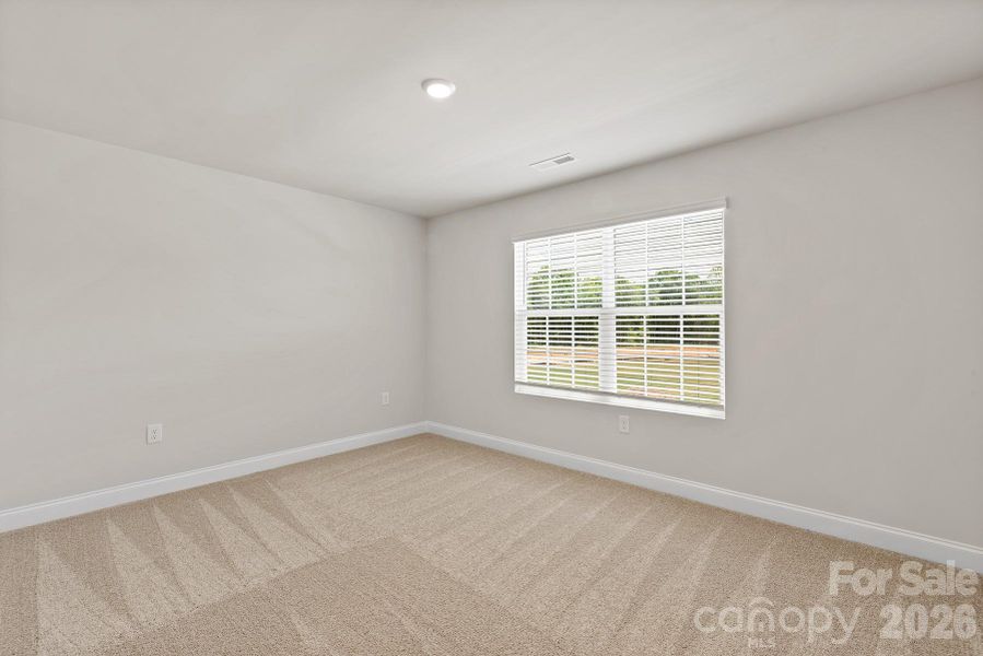 Spacious, unfurnished interior of a new home in Ascot Woods, Charlotte (Image 18).