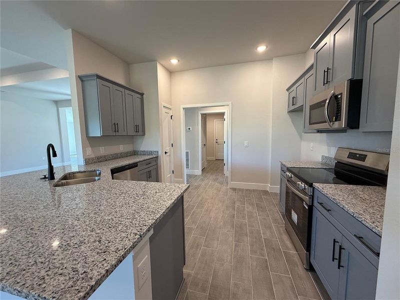 Furnished interior view inside a new home in , Port Charlotte (Image 5). Furnished interior view inside a new home in , Port Charlotte (Image 5).