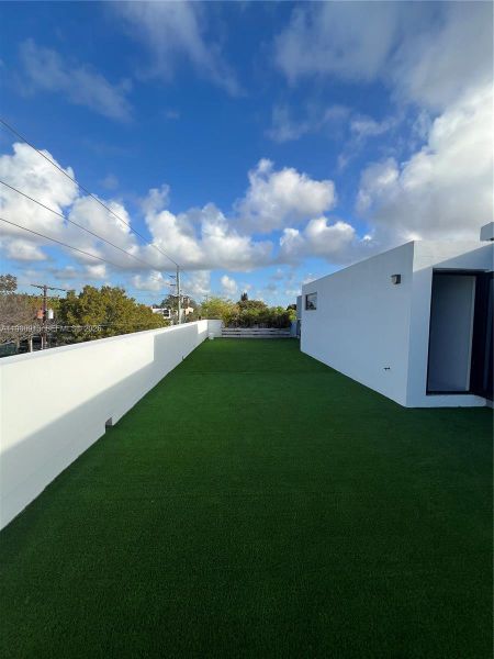 Exterior details and patio area of a home in , Miami (Image 17). Exterior details and patio area of a home in , Miami (Image 17).