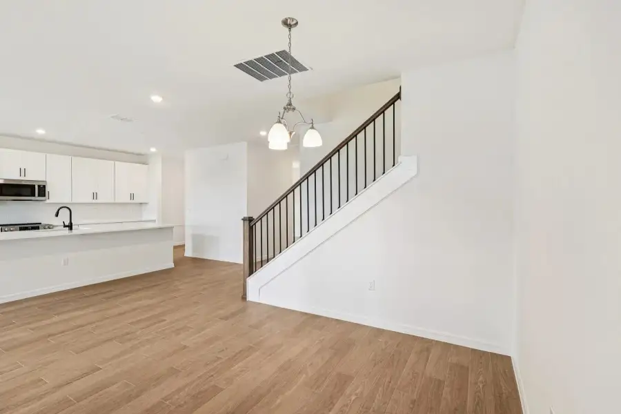 Spacious, unfurnished interior of a new home in Northlake at Ovation, Winter Garden (Image 21).