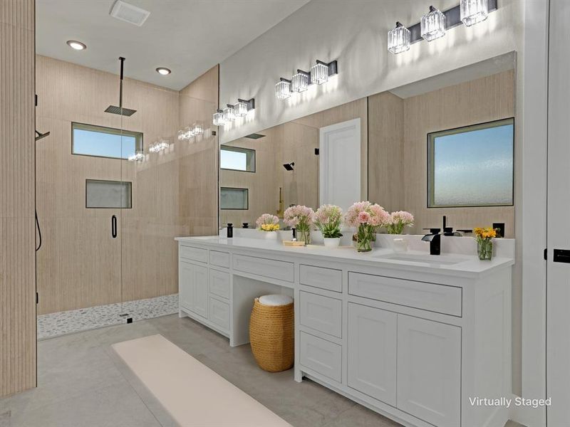 Bathroom with vanity, concrete flooring, and a shower with shower door