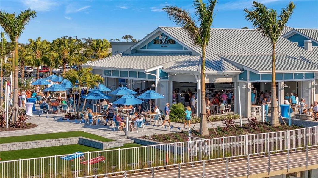 Front exterior of a new home in , Englewood, FL, highlighting curb appeal (Image 28). Front exterior of a new home in , Englewood, FL, highlighting curb appeal (Image 28).