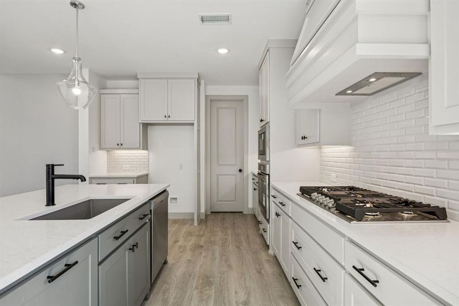 Site finished cabinetry, stainless appliances and gorgeous flooring combine to make this dream kitchen a reality! Site finished cabinetry, stainless appliances and gorgeous flooring combine to make this dream kitchen a reality!