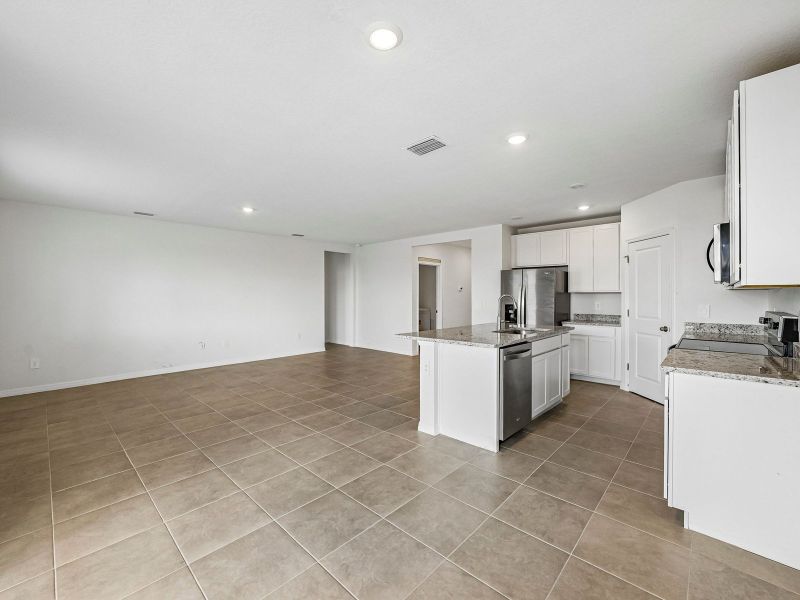 Furnished interior view inside a new home in The Reserve at Van Oaks, Auburndale (Image 6).