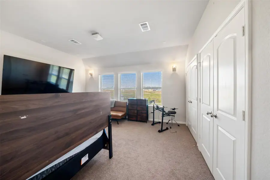 Furnished interior view inside a new home in Waterstone on Lake Conroe, Montgomery (Image 10).