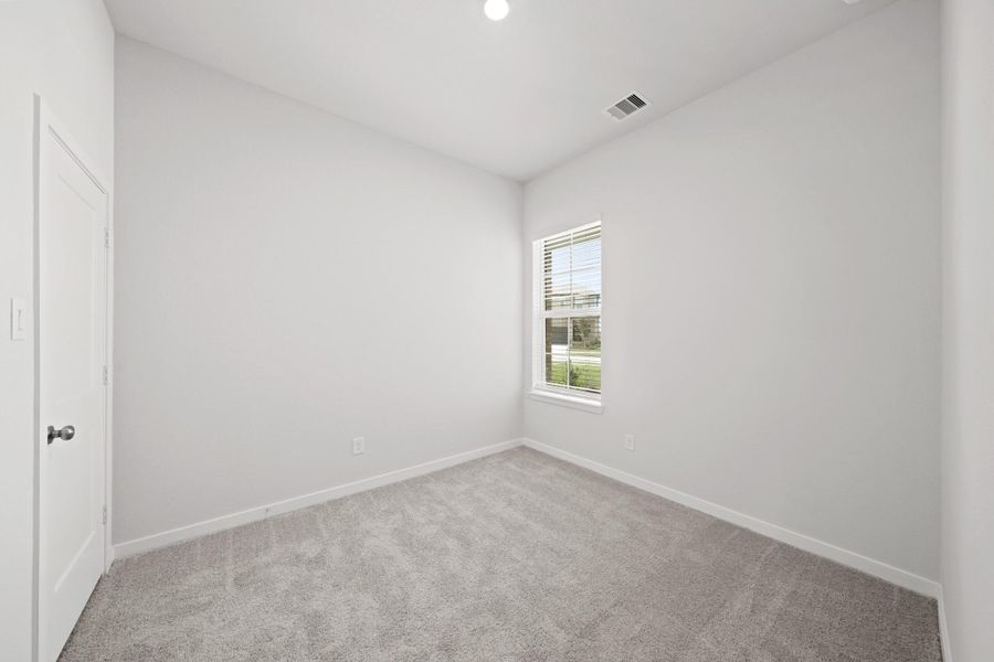 Spacious, unfurnished interior of a new home in Creekland Village at Bridgeland, Cypress (Image 15).