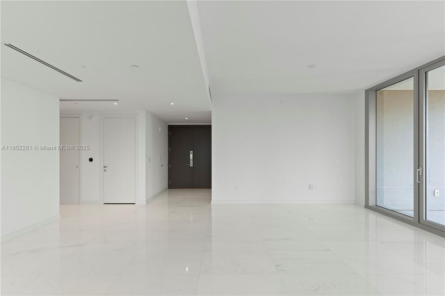 Spacious, unfurnished interior of a new home in Aston Martin Residences, Miami (Image 40).