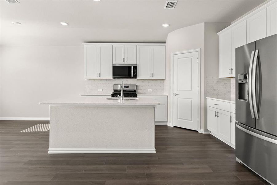 Furnished interior view inside a new home in River Ridge, Crandall (Image 1).