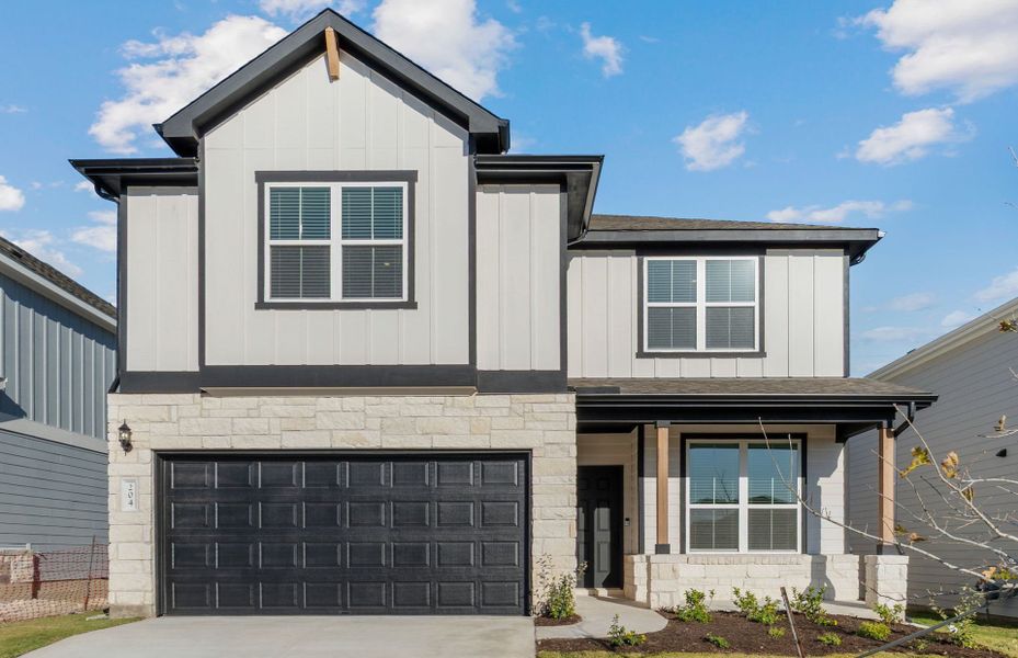 Front exterior of a new home in Patterson Ranch, Georgetown, TX, highlighting curb appeal (Image 21).