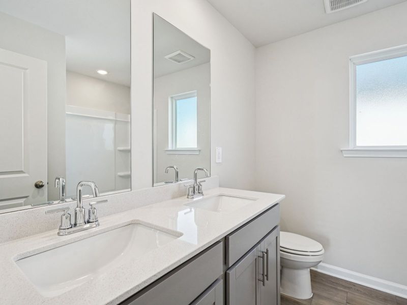 Furnished interior view inside a new home in Hemingway - Reserve Series, Cumming (Image 10). Furnished interior view inside a new home in Hemingway - Reserve Series, Cumming (Image 10).