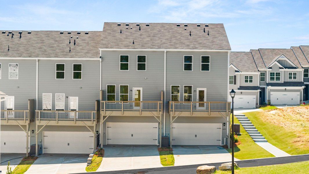 Representative exterior photo of a completed home built from the ADDINGTON by D.R. Horton in Waypoint, Flowery Branch, GA (Image 24).