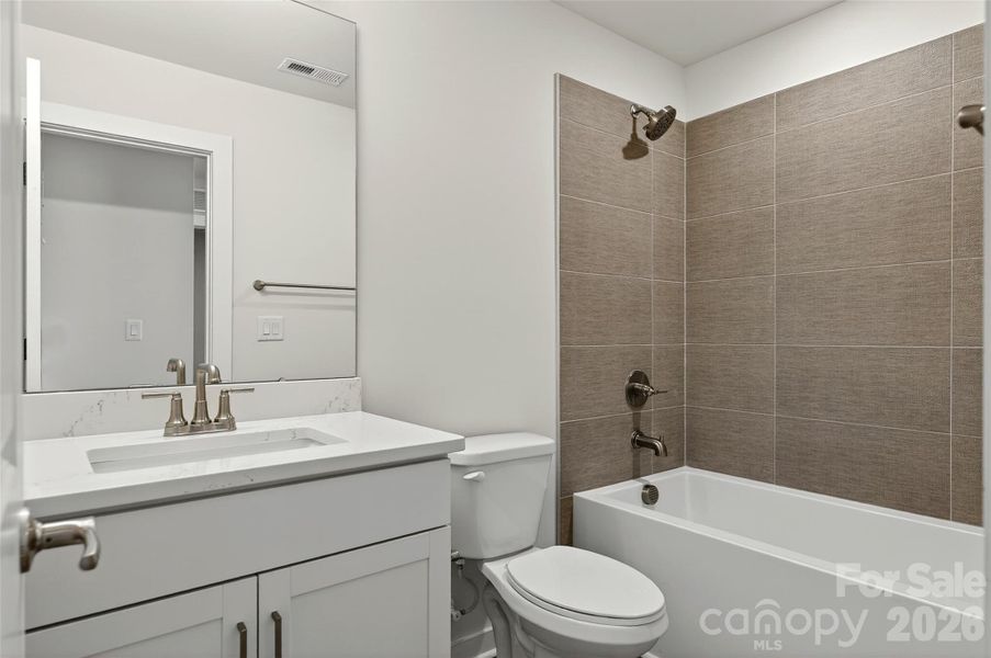 Furnished interior view inside a new home in The River District - Pioneer Collection, Charlotte (Image 6).