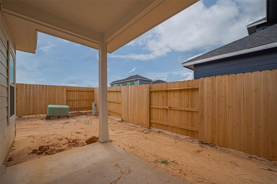 Exterior details and patio area of a home in La Segarra, Brookshire (Image 3).