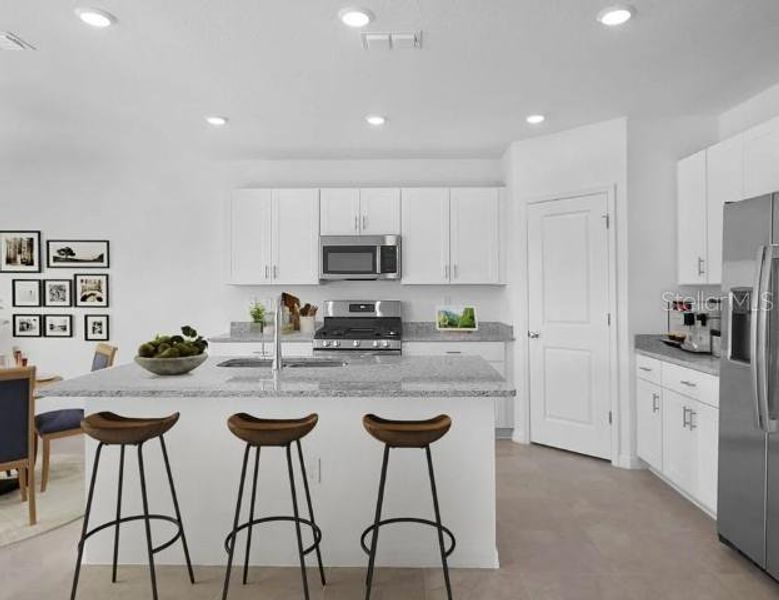 Furnished interior view inside a new home in Waterstone, Groveland (Image 13). Furnished interior view inside a new home in Waterstone, Groveland (Image 13).
