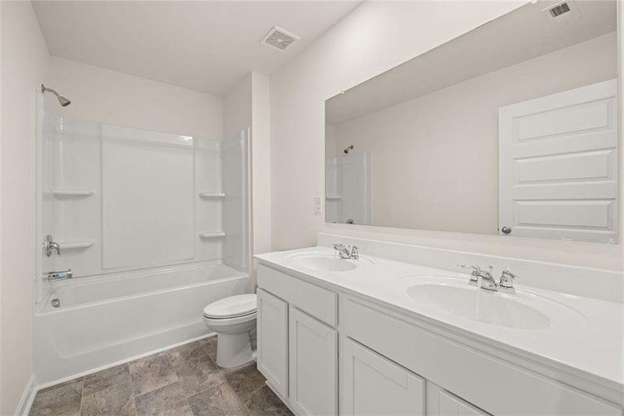 Furnished interior view inside a new home in Champion's Run, Lithonia (Image 5).