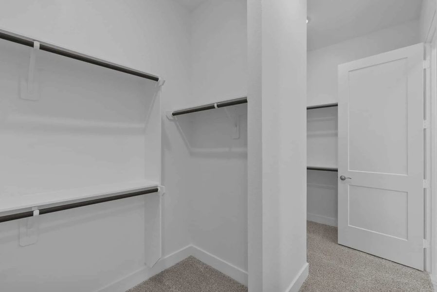 Representative unfurnished interior of a home built from the Nicklaus by Chesmar Homes in Riceland Alley Loads, Mont Belvieu (Image 77).