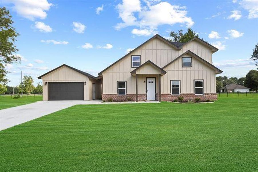 Front exterior of a new home in , Orange, TX, highlighting curb appeal (Image 2). Front exterior of a new home in , Orange, TX, highlighting curb appeal (Image 2).