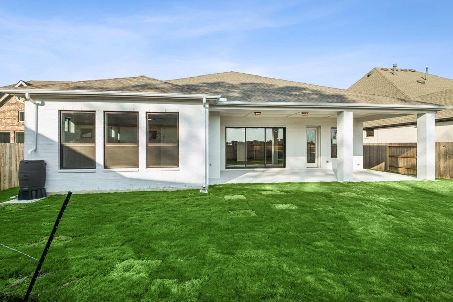 Exterior details and patio area of a home in ARTAVIA - Parkview Collection, Conroe (Image 3).