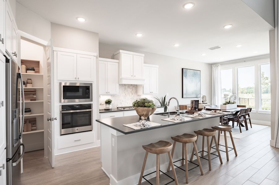 Representative furnished interior of a home built from the Verdin by Tri Pointe Homes in Pecan Ridge, Fulshear (Image 62).