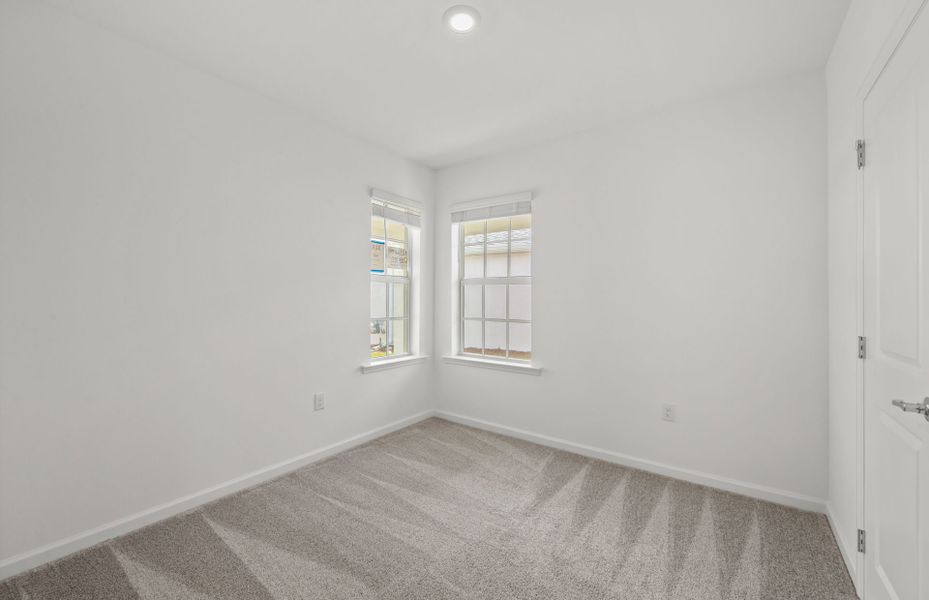 Spacious, unfurnished interior of a new home in Reagan Landing, Bradenton (Image 14).