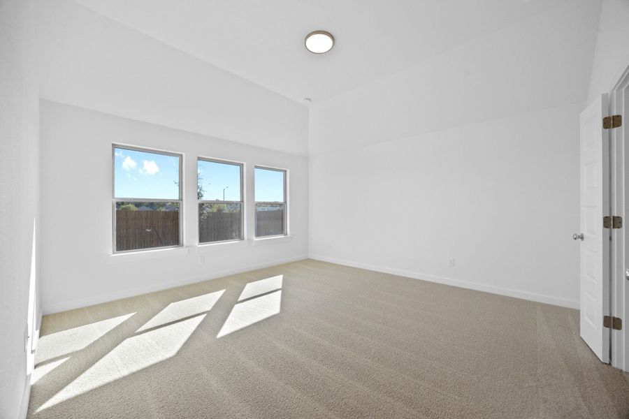 Primary Suite in the Quartz home plan by Trophy Signature Homes – REPRESENTATIVE PHOTO