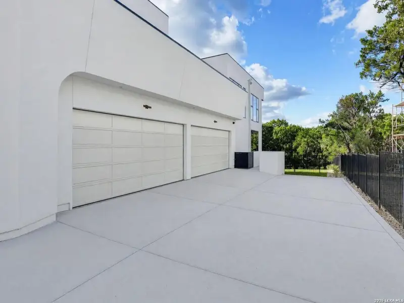 Exterior details and patio area of a home in , San Antonio (Image 39).