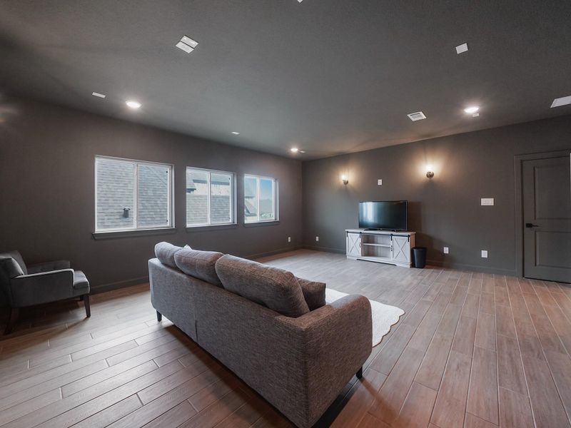 Another angle of the media room highlights its generous size, giving you freedom to design the ultimate cinematic retreat.