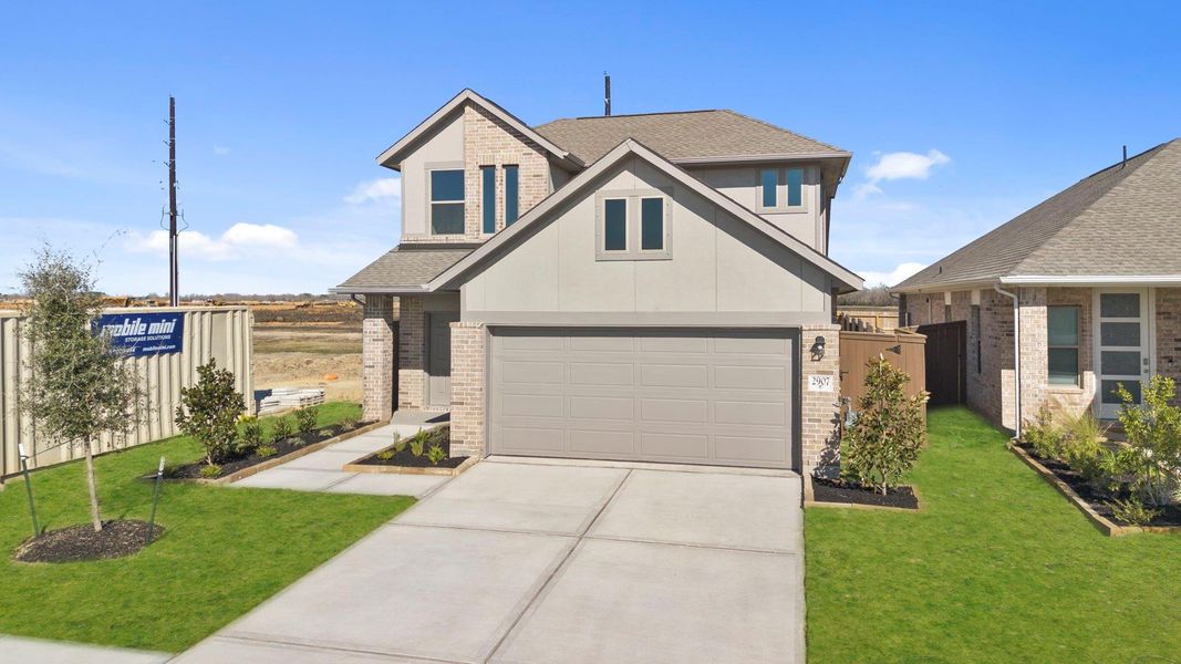 Front exterior of a new home in Creekhaven, Rosharon, TX, highlighting curb appeal (Image 19).