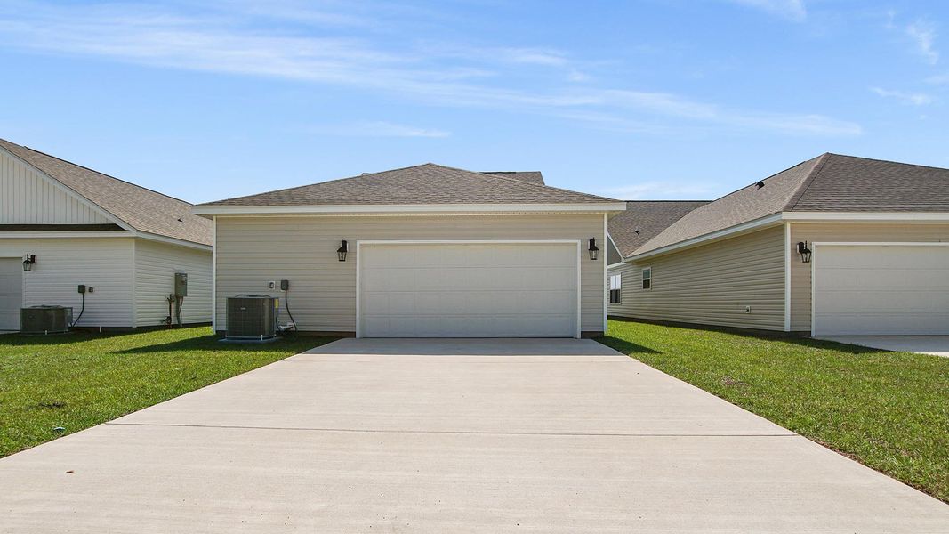 Exterior details and patio area of a home in Owl's Head East, Freeport (Image 17).