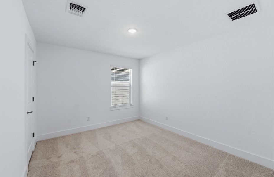 Spacious, unfurnished interior of a new home in Saddleback at Santa Rita Ranch, Liberty Hill (Image 32).