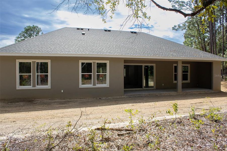 Exterior details and patio area of a home in Pine Ridge Estates, Beverly Hills (Image 5). Exterior details and patio area of a home in Pine Ridge Estates, Beverly Hills (Image 5).