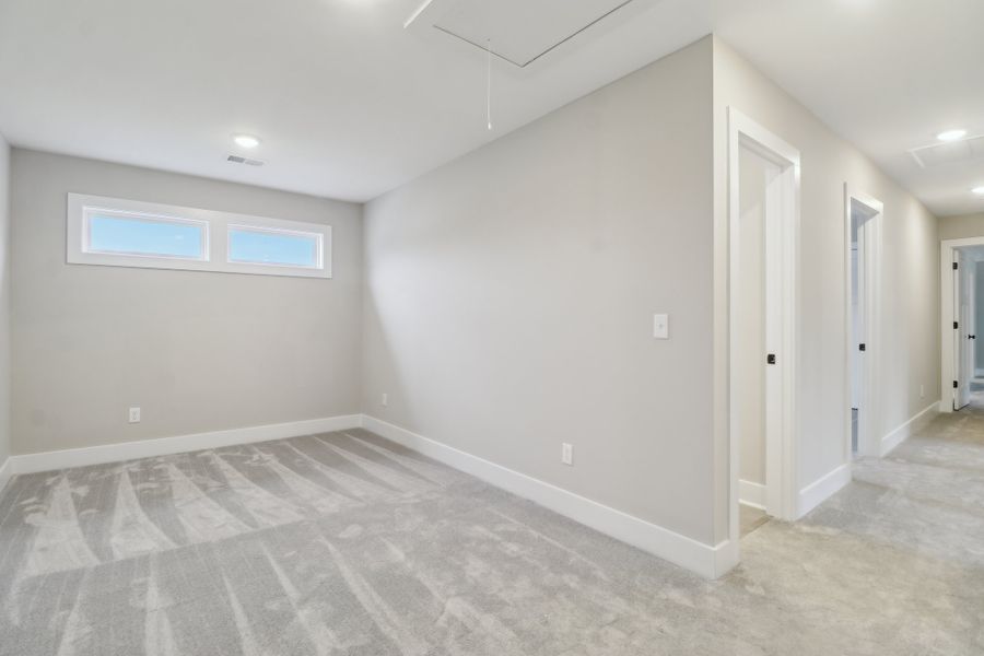Representative unfurnished interior of a home built from the Ashbourne II by Great Southern Homes in Collins Cove, Chapin (Image 25).