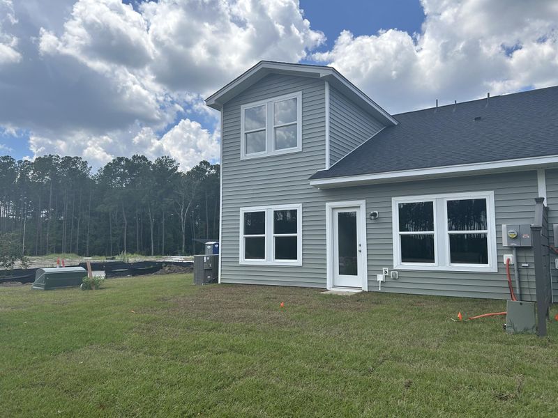 Exterior details and patio area of a home in Hammock Walk at Nexton, Summerville (Image 18).