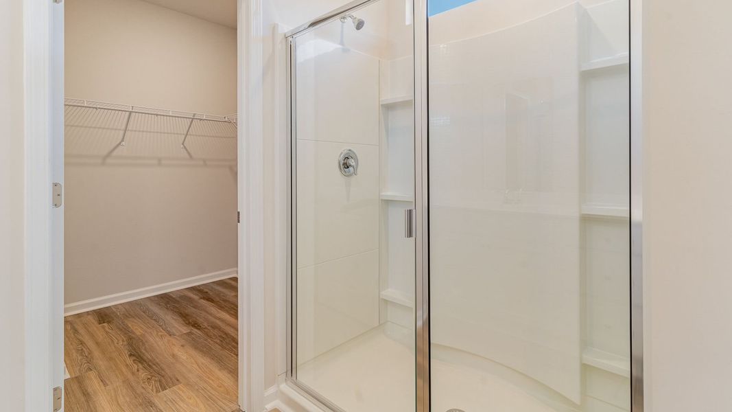Representative unfurnished interior of a home built from the WREN by D.R. Horton in Saltgrass Landing, Winnabow (Image 21).