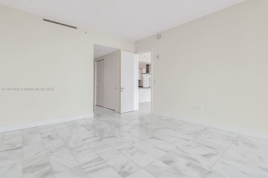 primary bedroom with bay view