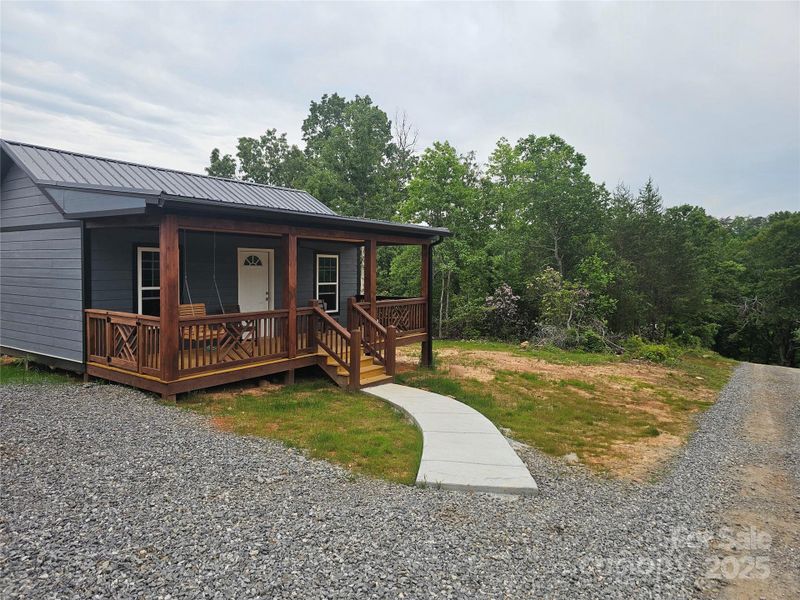 Front exterior of a new home in , Old Fort, NC, highlighting curb appeal (Image 2).