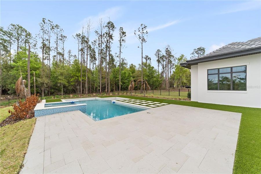 Exterior details and patio area of a home in Bella Collina, Montverde (Image 27). Exterior details and patio area of a home in Bella Collina, Montverde (Image 27).