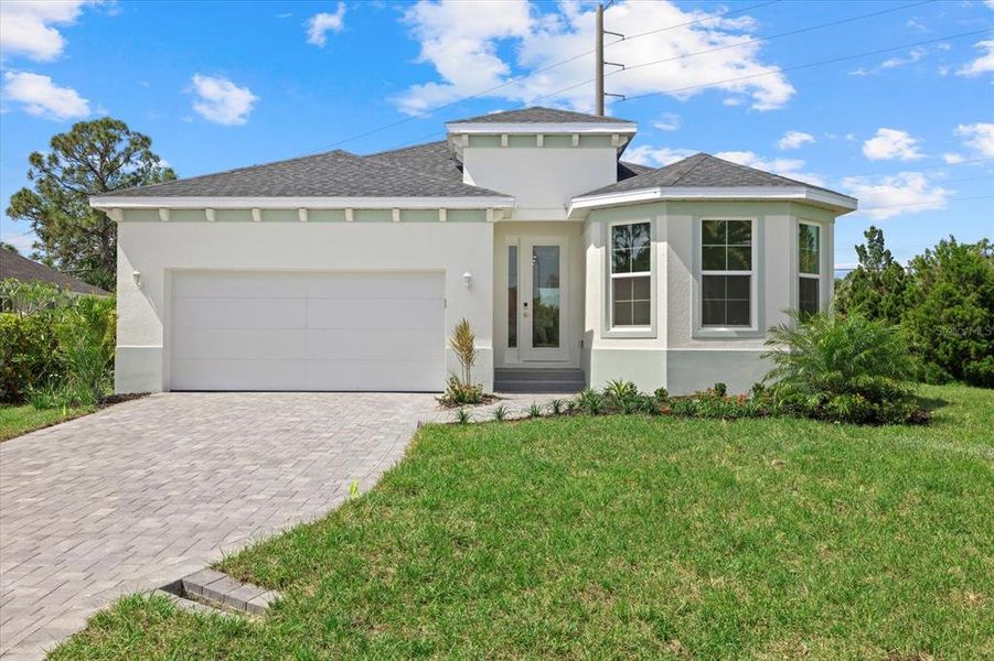 Front exterior of a new home in , Punta Gorda, FL, highlighting curb appeal (Image 17). Front exterior of a new home in , Punta Gorda, FL, highlighting curb appeal (Image 17).