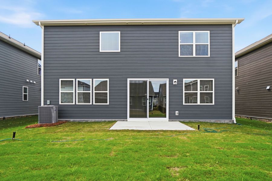 Exterior details and patio area of a home in Waxhaw Landing, Monroe (Image 16).