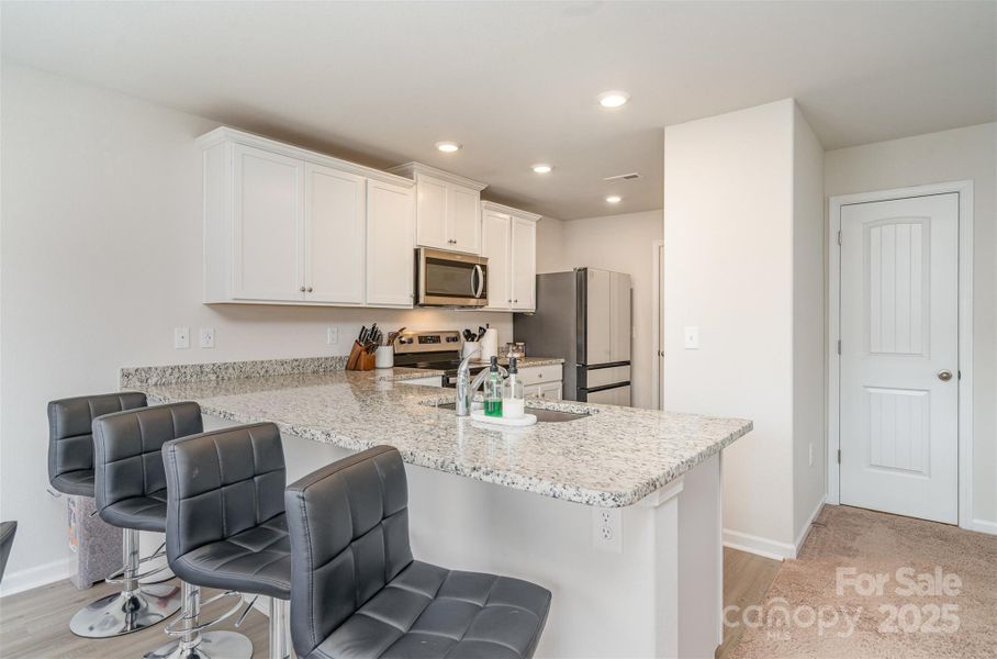 Furnished interior view inside a new home in , Charlotte (Image 9).