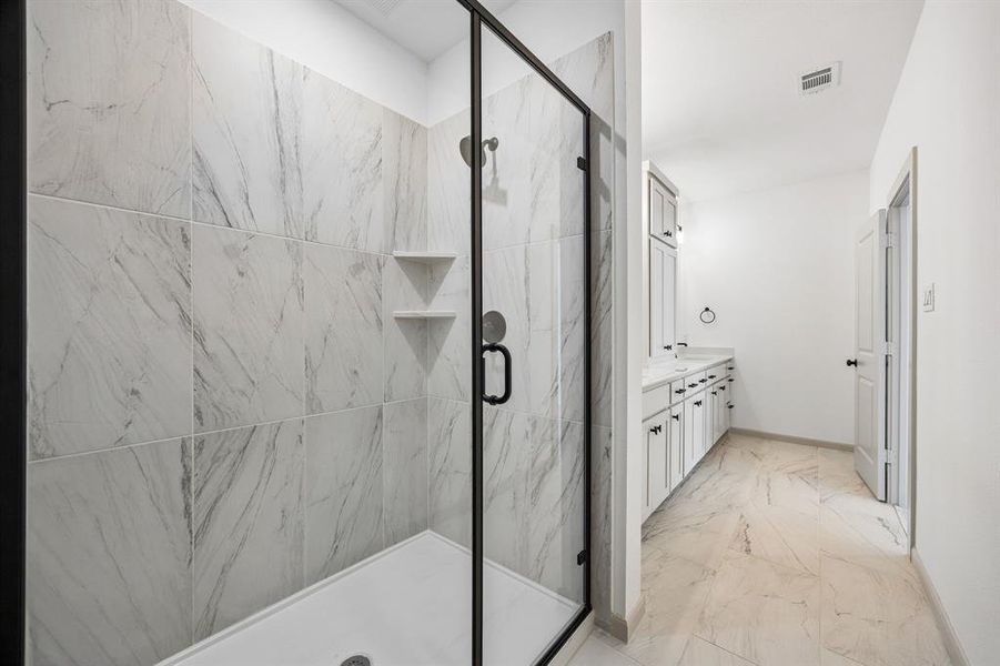 In addition to ample vanity and storage space, you'll enjoy a spacious walk in shower in this dream owner's bath! In addition to ample vanity and storage space, you'll enjoy a spacious walk in shower in this dream owner's bath!