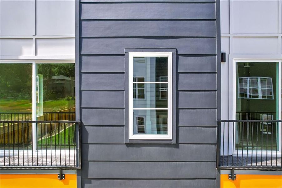 Front exterior of a new home in The Moderns at Sugar Creek Phase III, Atlanta, GA, highlighting curb appeal (Image 23).