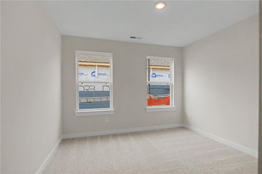 Spacious, unfurnished interior of a new home in The Park at Brighton, Locust Grove (Image 19).