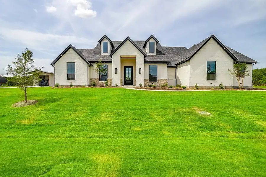 Representative exterior photo of a completed home built from the The Colin by Elmwood Custom Homes in Aledo Heights, Aledo, TX (Image 1).