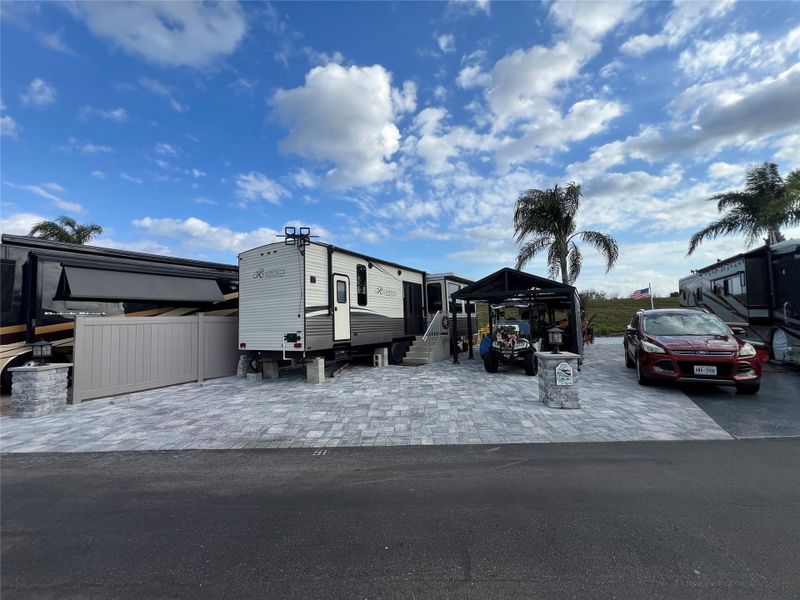 Front exterior of a new home in , Okeechobee, FL, highlighting curb appeal (Image 2).