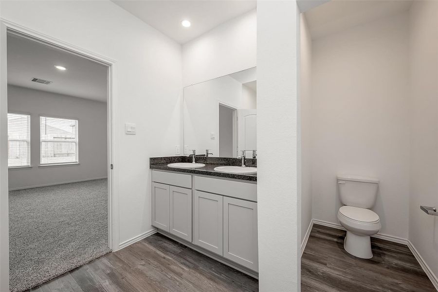 Furnished interior view inside a new home in Breckenridge Forest, Spring (Image 14).