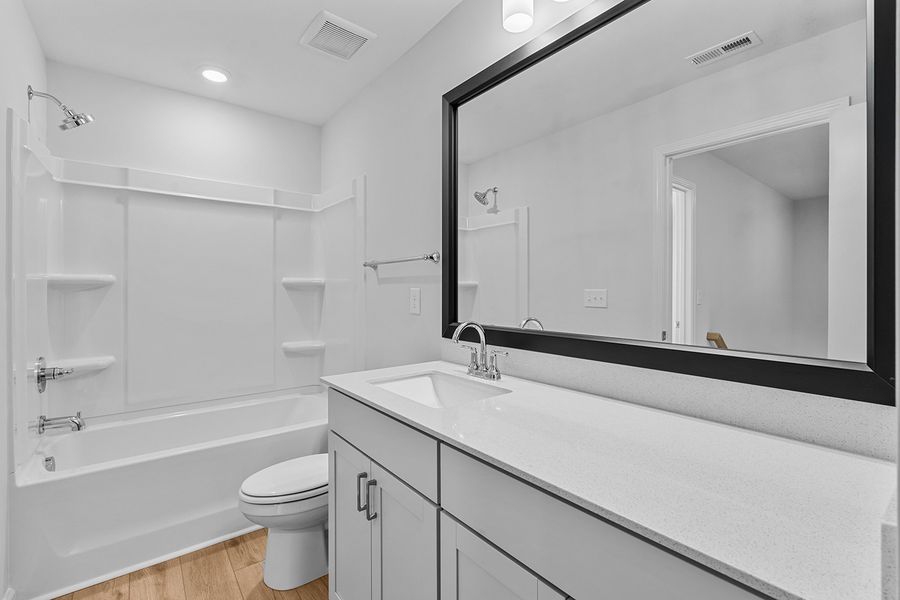 Furnished interior view inside a new home in Brayden, Advance (Image 17).